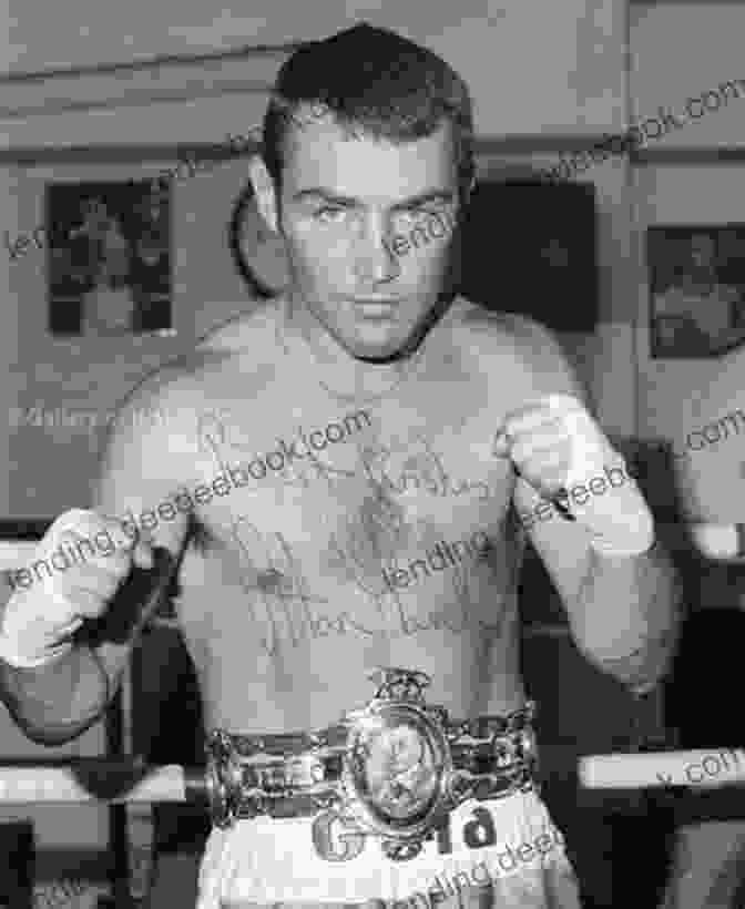 A Black And White Photograph Of Vinnie War Minter In A Boxing Stance, Wearing Gloves And Trunks. Vinnie S War J Minter