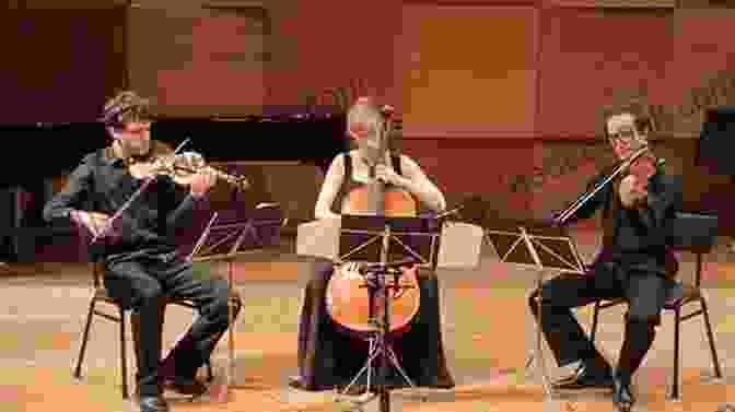 A Photograph Of A Cello Trio Performing Trio Tapestry: For Cello Ensemble