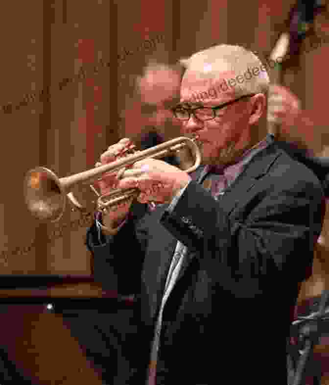 Carmine Caruso Performing On The Trumpet, His Face Displaying The Focus And Intensity Of A Virtuoso Musician. Carmine Caruso Musical Calisthenics For Brass